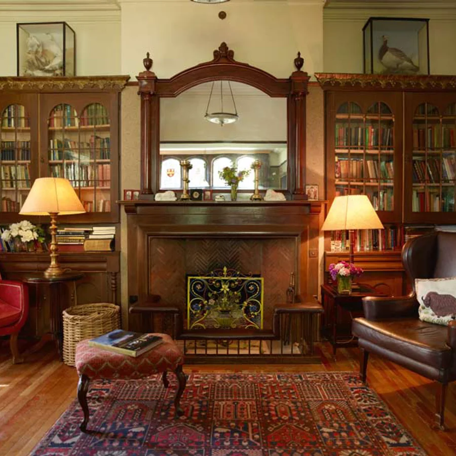 The historic library and fireplace at Langar Hall